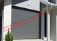 Puertas seccionales bien aisladas modernas del garaje del concepto fáciles actuar eléctricamente o manualmente proveedor