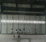 Diseño típico dirigido de la puerta aeronáutica unidireccional del hangar con el wicket proveedor