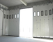 Puerta aislada de desplazamiento lateral los 25m/S del garaje con Vision Windows y wicket proveedor