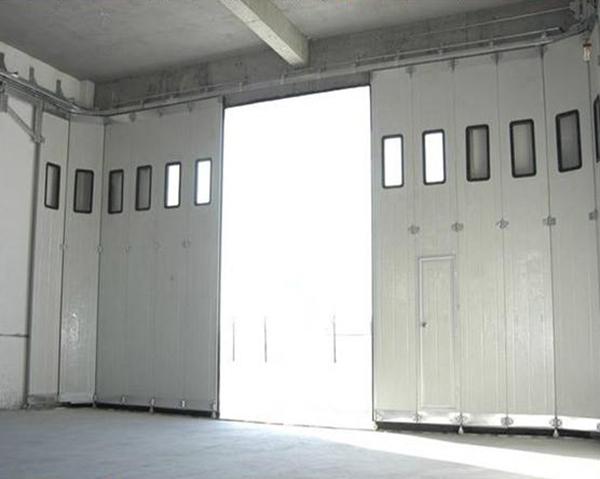 Puerta aislada de desplazamiento lateral los 25m/S del garaje con Vision Windows y wicket 0