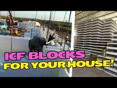 Bloque de alojamiento de dos pisos con un techo moderno y una pared exterior y un parking